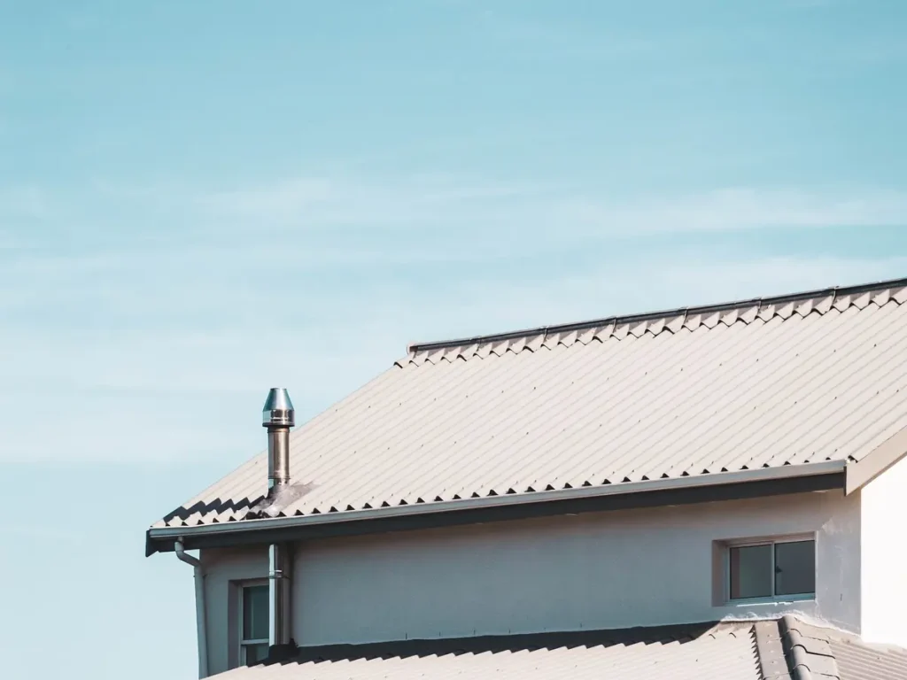 Light-colored metal roof on a home near Boston Harbor, WA