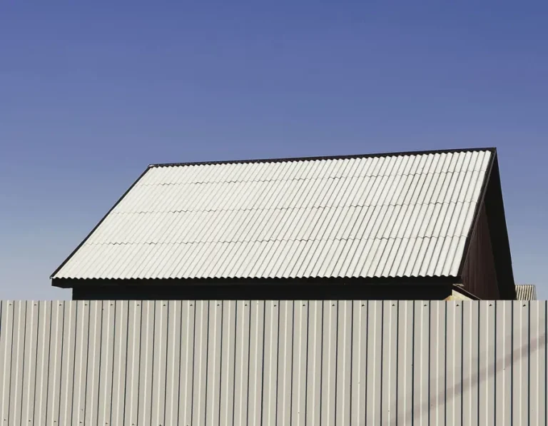 Standing seam metal roof panels on a gable roof